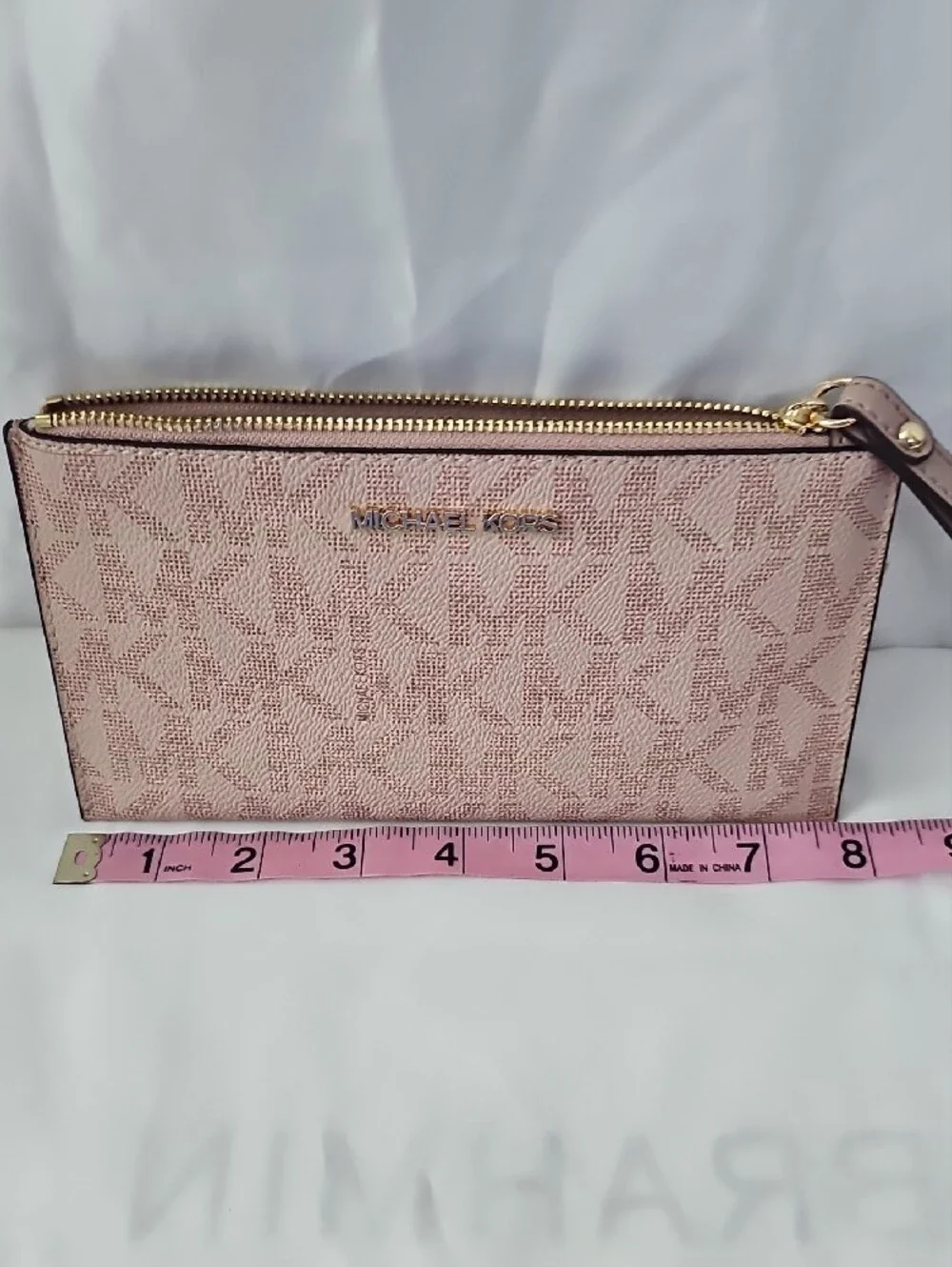 Michael Kors Blush Pink Signature Wristlet with Gold Hardware